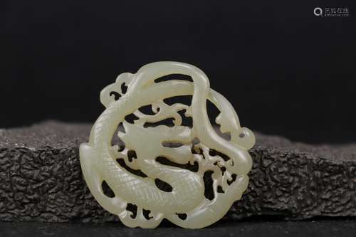 A WHITE JADE OPENWORK 'DRAGON' PLAQUE