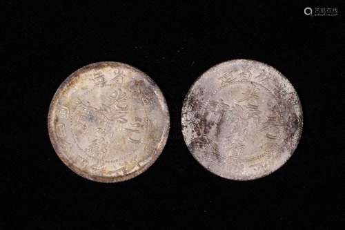 TWO CHINESE COINS, MADE IN JILIN PROVINCE