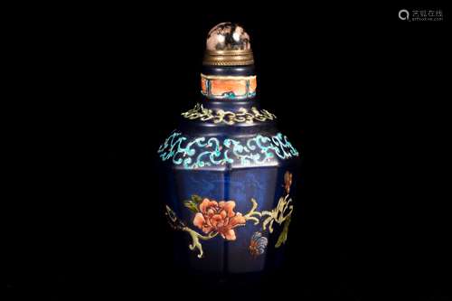 AN ENAMELED BLUE GLASS SNUFF BOTTLE