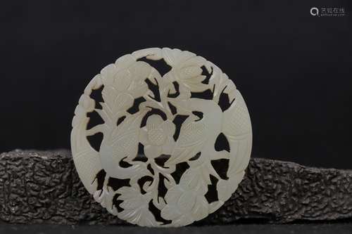 A WHITE JADE OPENWORK 'FLOWER AND BIRD' PLAQUE