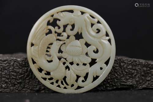 A WHITE JADE OPENWORK 'FLOWER AND BIRD' PLAQUE