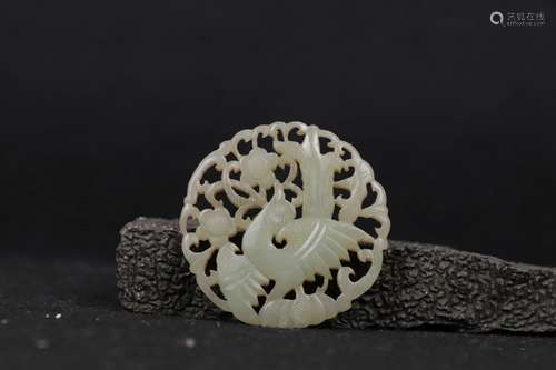 A WHITE JADE OPENWORK 'FLOWER AND BIRD' PLAQUE