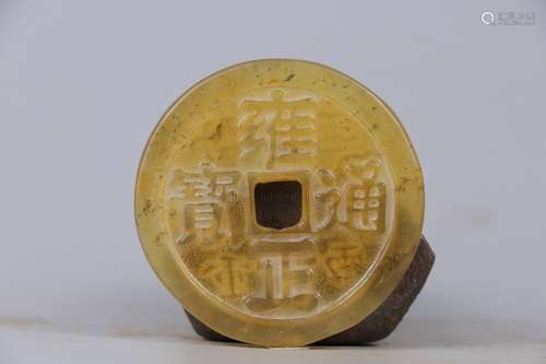 A JADE CARVING OF CHINESE COIN