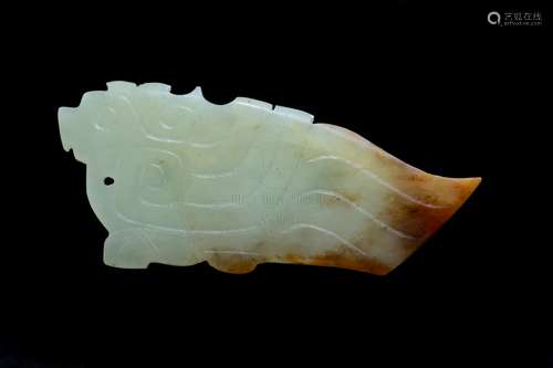 A PALE GREENISH AND BROWN JADE BIRD-FORM CARVING