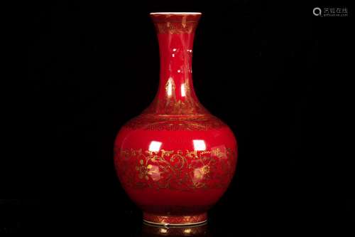 A IRON-RED AND GIL-DECORATED VASE