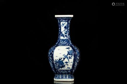 A BLUE AND WHITE FLORAL VASE