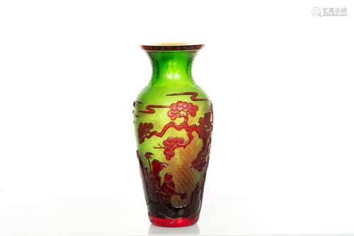 A RED OVERLAY GREEN GLASS VASE