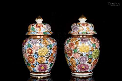 A PAIR OF MILLEFLERUS JARS WITH COVERS