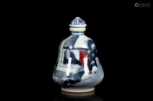 A BLUE AND WHITE AND IRON RED 'FIGURAL' SNUFF BOTTLE