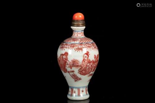 A BLUE AND WHITE AND IRON RED 'FIGURAL' SNUFF BOTTLE