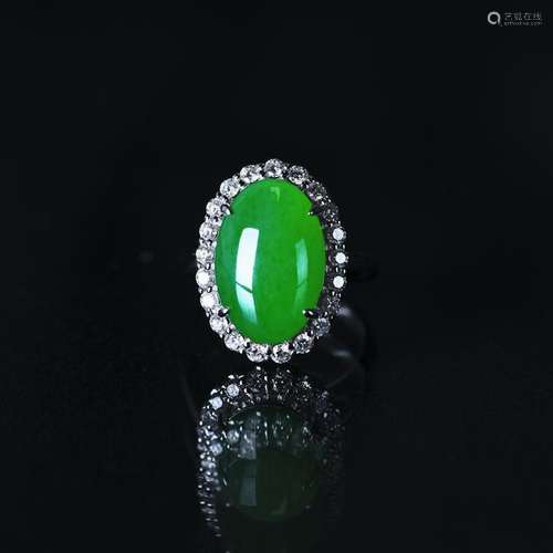 A JADEITE AND DIAMOND RING