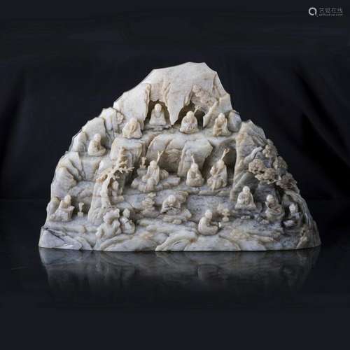 A HETIAN JADE CARVING OF EIGHTEEN-LUOHAN