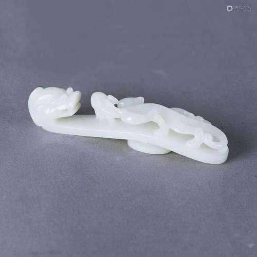 A WHITE JADE 'DRAGON' BELT HOOK, QING DYNASTY