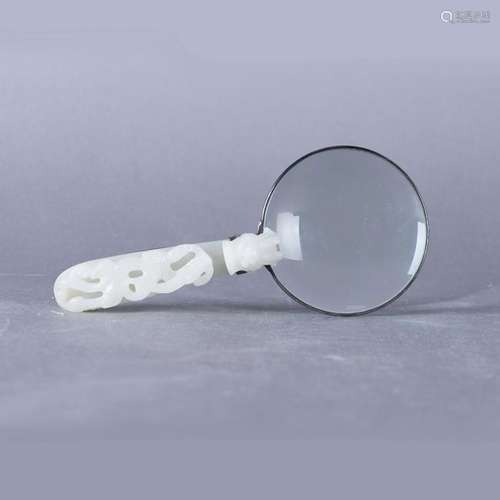 A WHITE JADE 'DRAGON' MAGNIFIER, QING DYNASTY