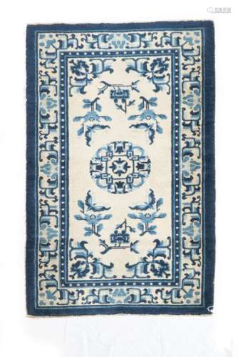 Rug, China \nCream coloured ground with blue décor …