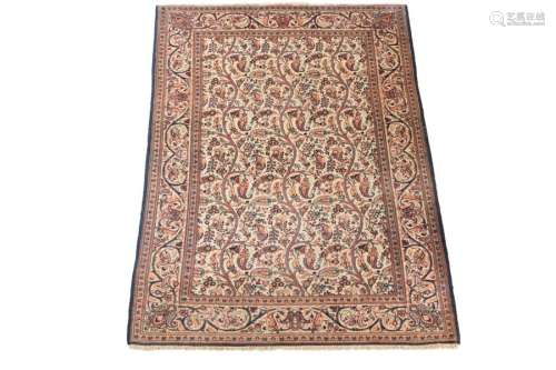 Kashan rug \nCream coloured ground, decorated with …