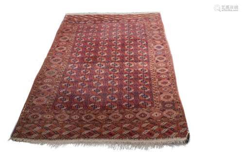 Bokhara rug \nRed ground, decorated with six rows o…