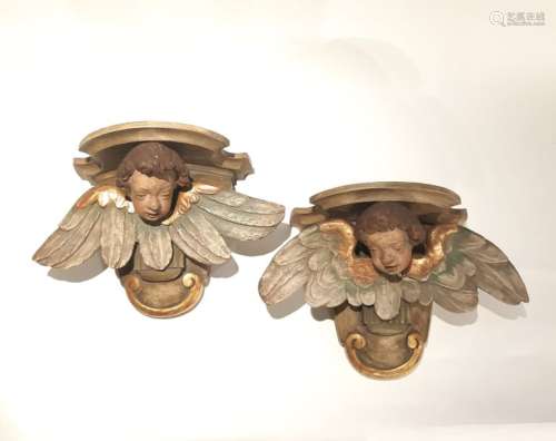 Two cherub heads \nGilded and polychrome wood and s…
