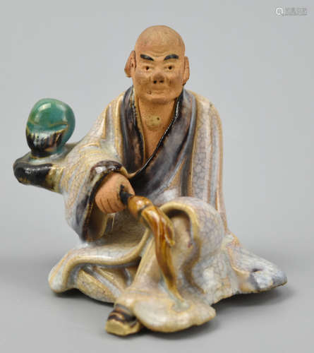 Chinese Shiwan Ware Figure of Luohan, 20th C.