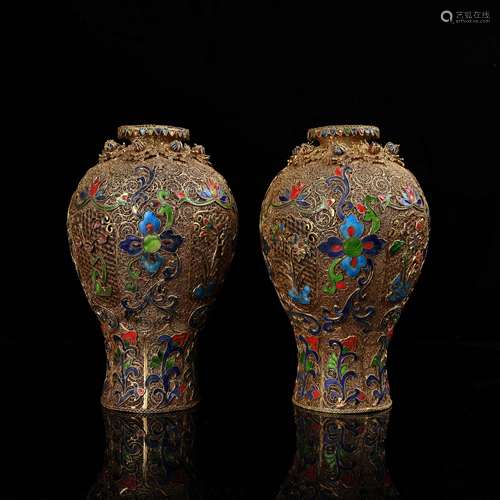 A Pair of Gilt Silver Vases