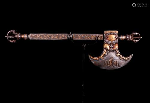 A Chinese Gilt Iron Instrument