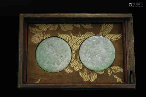 A Pair of Carved Jadeite Pendants