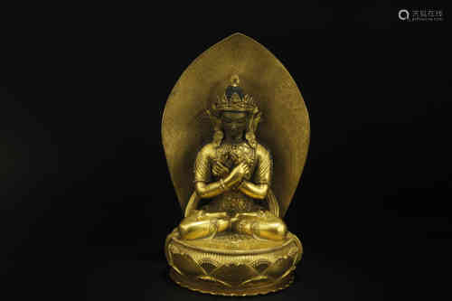 A Chinese Gilt Bronze Figure of Buddha