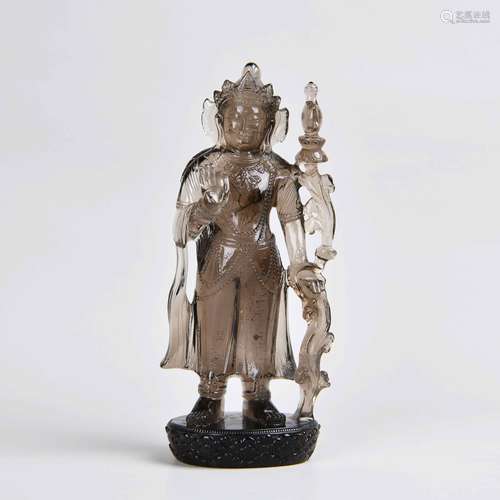 A Chinese Carved Rock Crystal Figure of Buddha