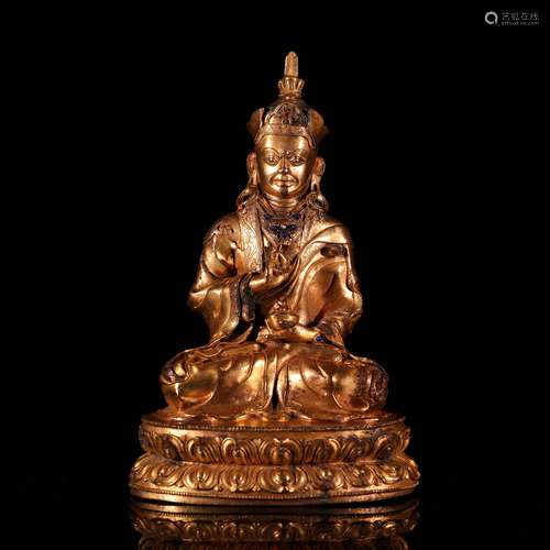 A Chinese Gilt Bronze Figure of Buddha