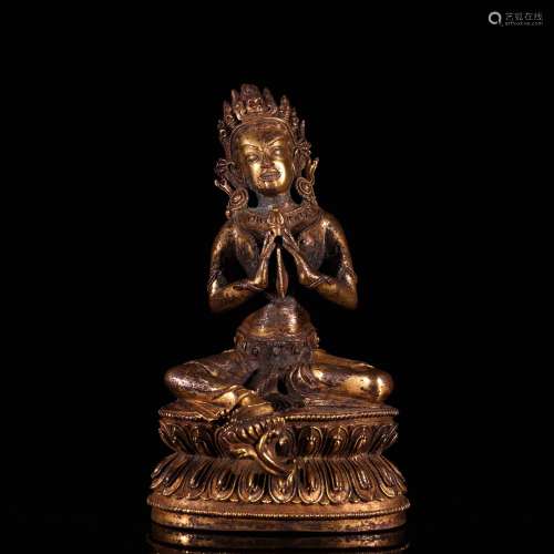 A Chinese Gilt Bronze Figure of Buddha