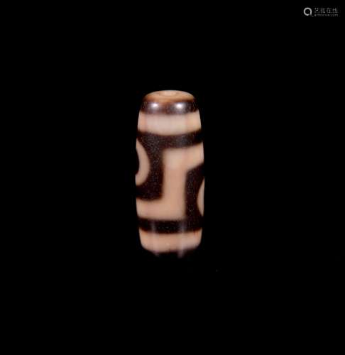 A Chinese Carved Agate DZI Bead