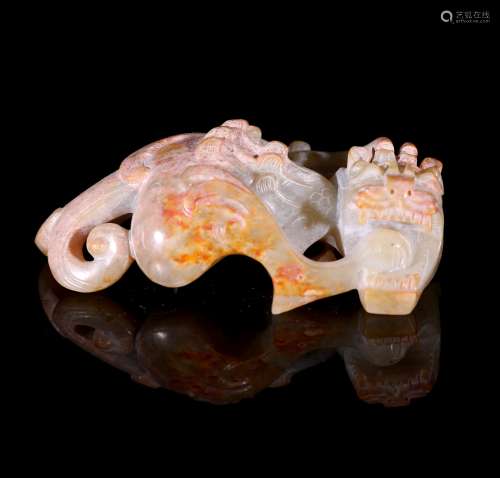 A Chinese Carved Jade Foo-Dog