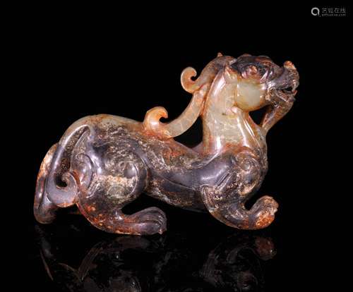 A Chinese Carved Jade Foo-Dog