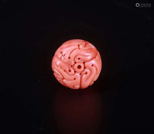 A Chinese Carved Coral Pendant