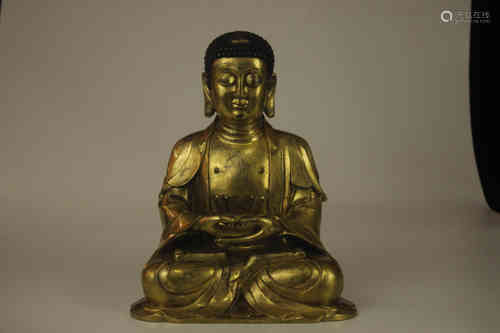 A Chinese Gilt Bronze Figure of Buddha