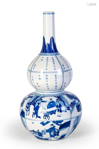 A BLUE AND WHITE GOURD SHAPED VASE