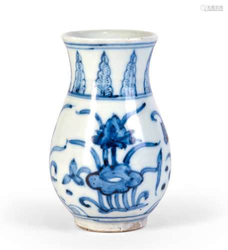 A BLUE AND WHITE VASE WITH FLOWERS