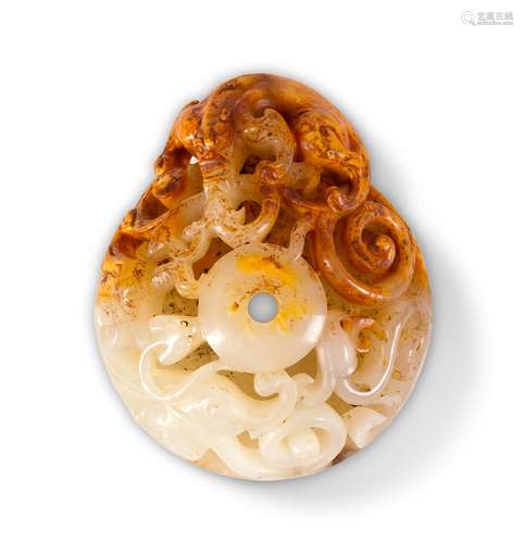 A CARVED JADE PENDANT