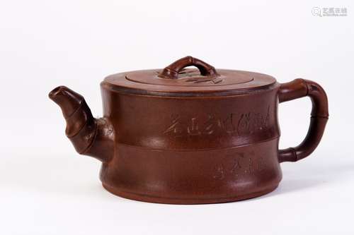 A YIXING CLAY POT TEAPOT BY 