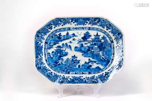 A BLUE AND WHITE SQUAR DISH WITH LANDSCAPES