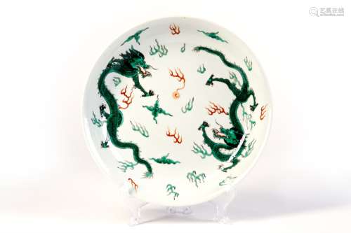 A GREEN GLAZED DISH WITH TWO DRAGENS