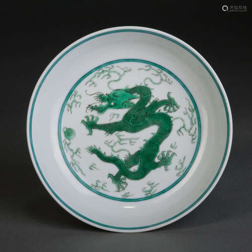 A GREEN GLAZED DISH WITH DRAGON