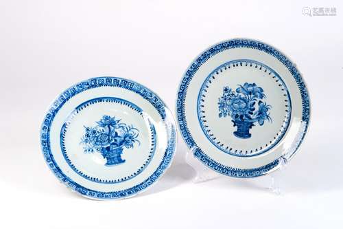 A GROUP OF BLUE AND WHITE DISH WITH FLOWERS IN BASKET