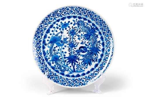 A BLUE AND WHITE DISH WITH TWO DRAGONS