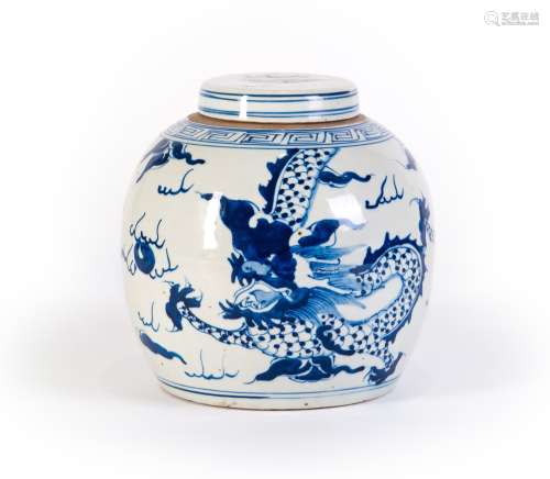 A BLUE AND WHITE JAR WITH DRAGON