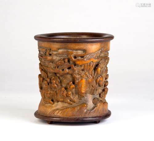 A CARVED BAMBOO BRUSH HOLDER WITH EIGHTEEN ARHATS