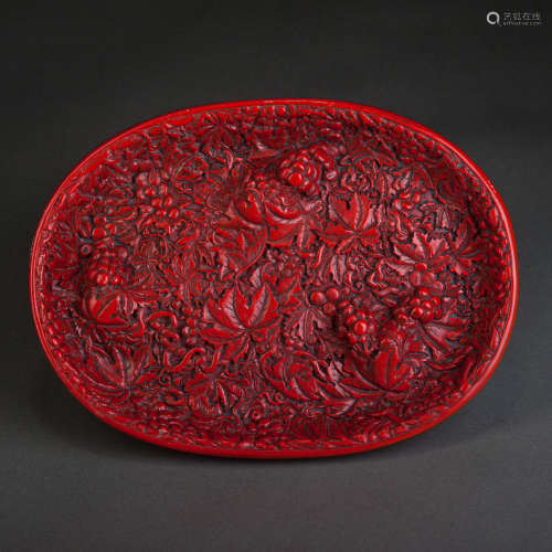 A RED CARVED LACQUER DISH