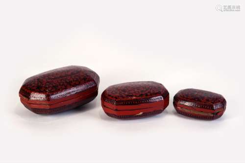 A GROUP OF RED CARVED LACQUER BOX WITH PEONY