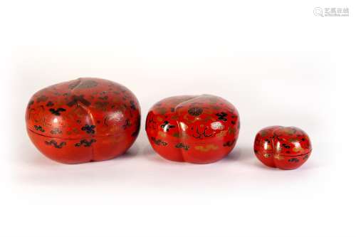A GROUP OF PEACH-SHAPED RED CARVED LACQUER BOX