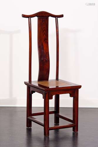 A HARD WOOD CHAIR